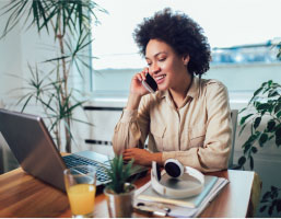 Entrepreneur Sitting At A Desk In Home Office Working Online Full